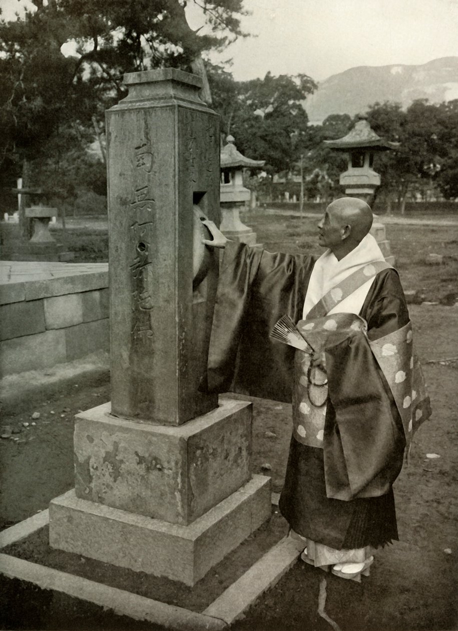 Um padre budista e roda de oração, 1910. de Herbert Ponting