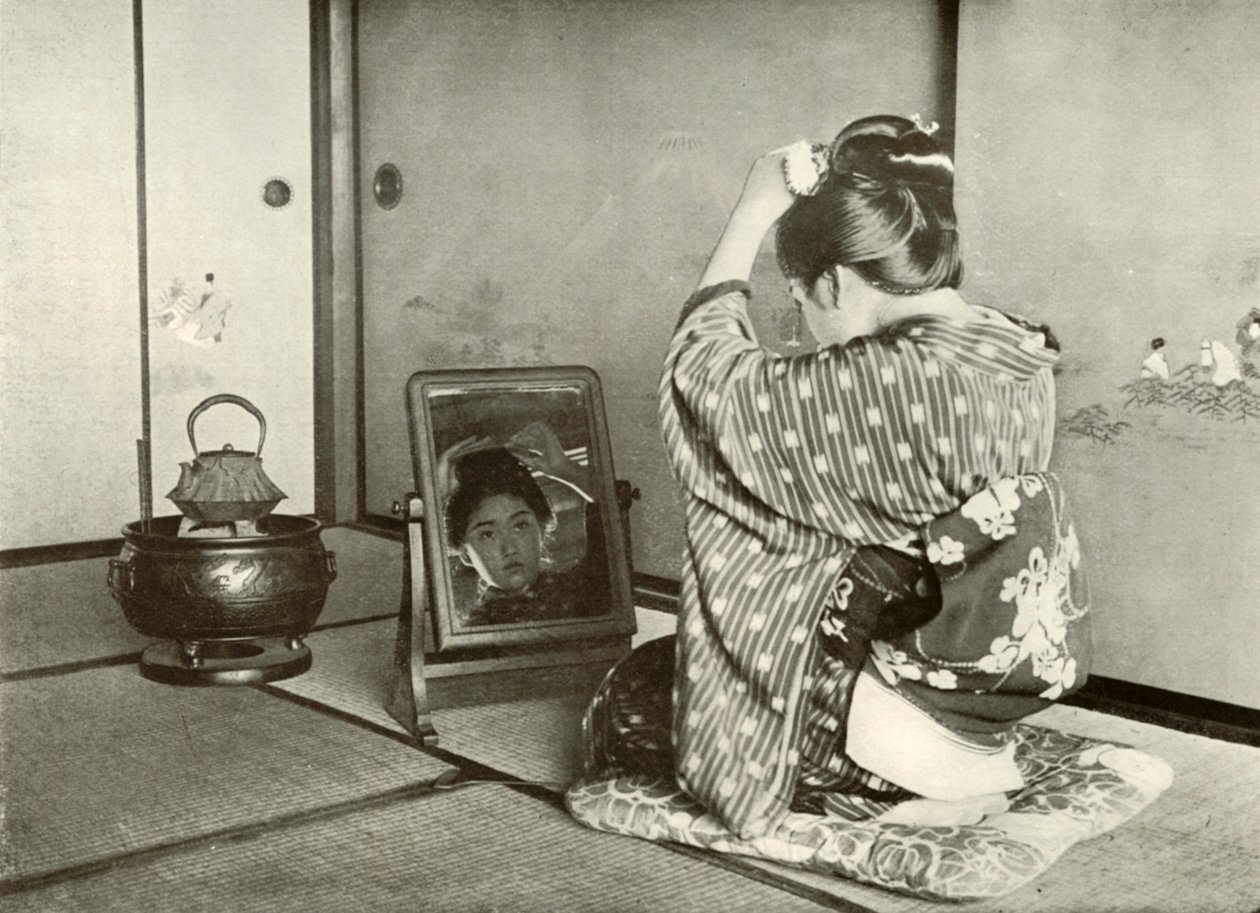 Preparando-se para o dia, 1910. de Herbert Ponting