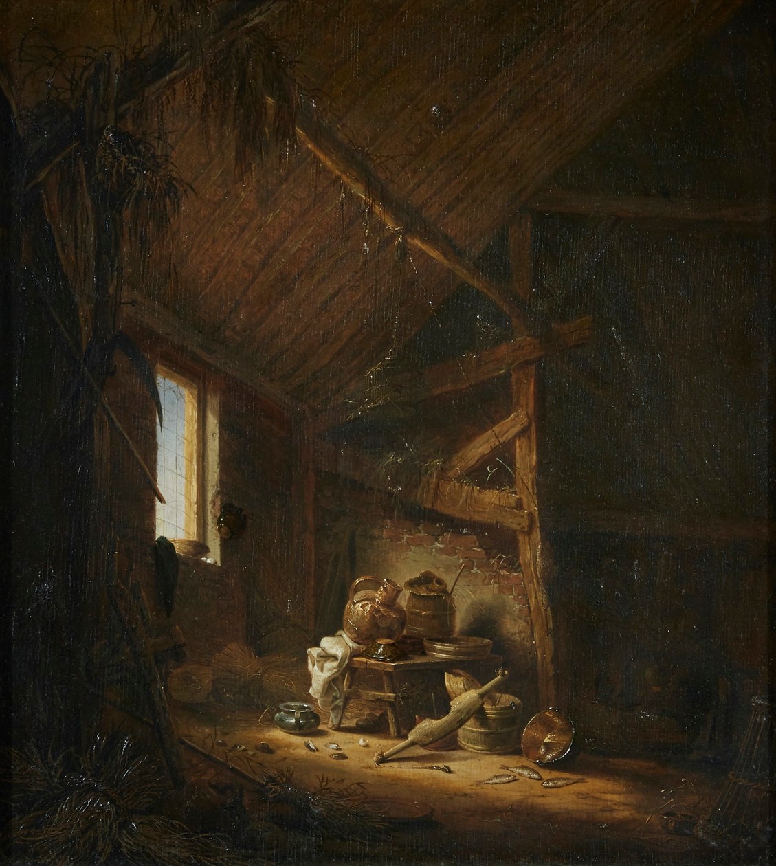 O interior de um celeiro com luz a passar por uma janela de Herman Saftleven