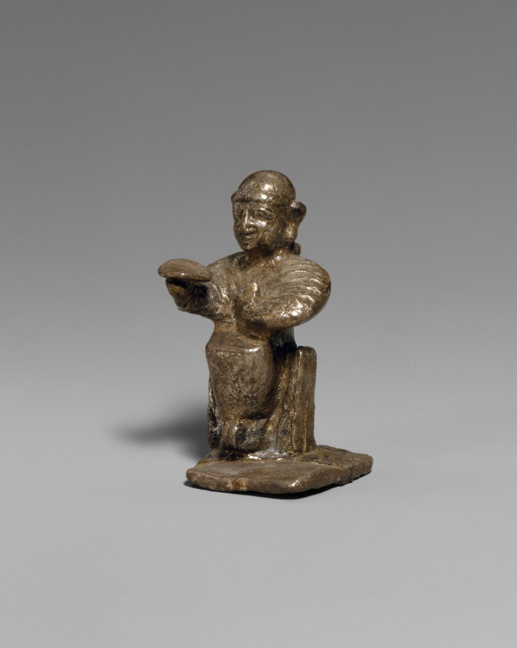 Fêmea sentada, séc. XIV-XIII a.C. (prata) de Hittite