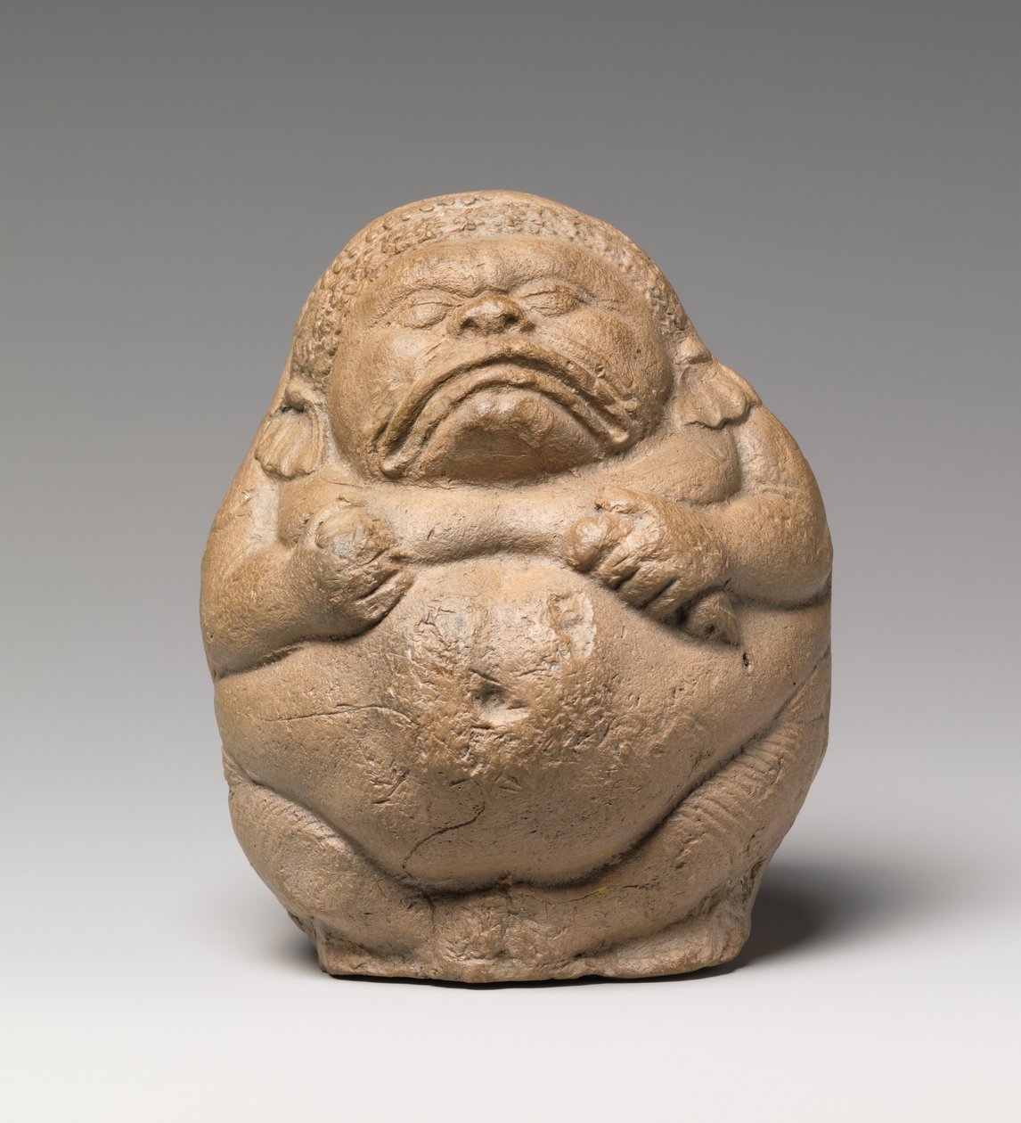 Rattle in the Form of a Crouching Grotesque Yaksha (terracota) de Indian School