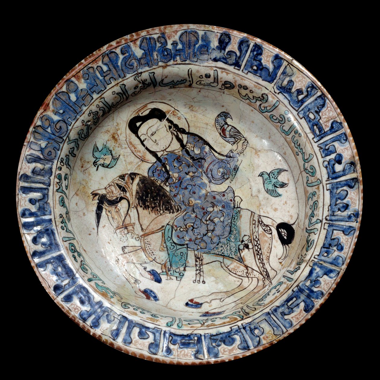 Arte islâmica: prato de cavaleiro falcoeiro em cerâmica. O início do século XIII. Do Irão. Paris, Museu do Louvre. de Islamic School