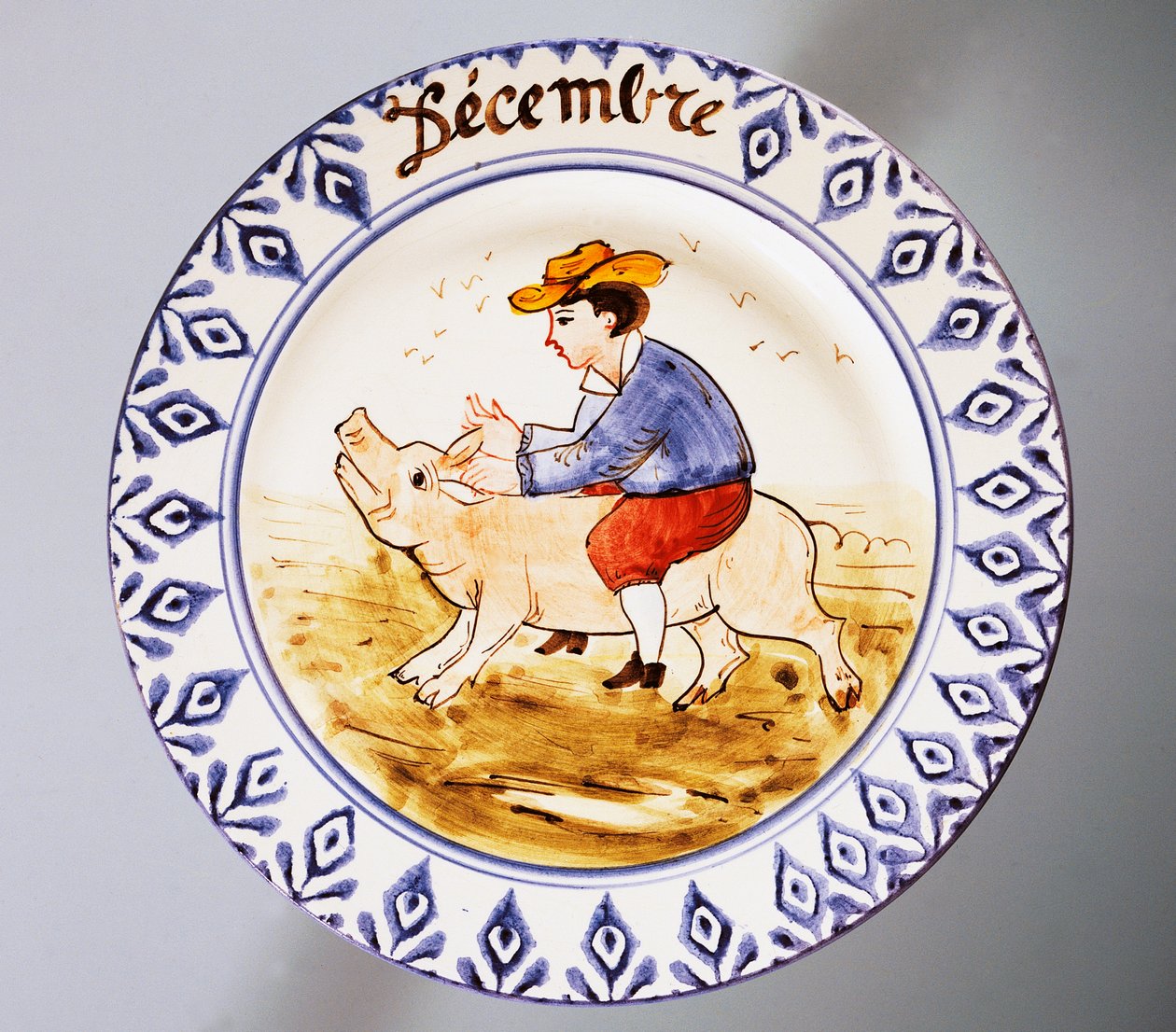 Prato representando os meses, dezembro, faiança, fabrico Nove di Bassano, região de Veneto, Itália, século XX. de Italian School