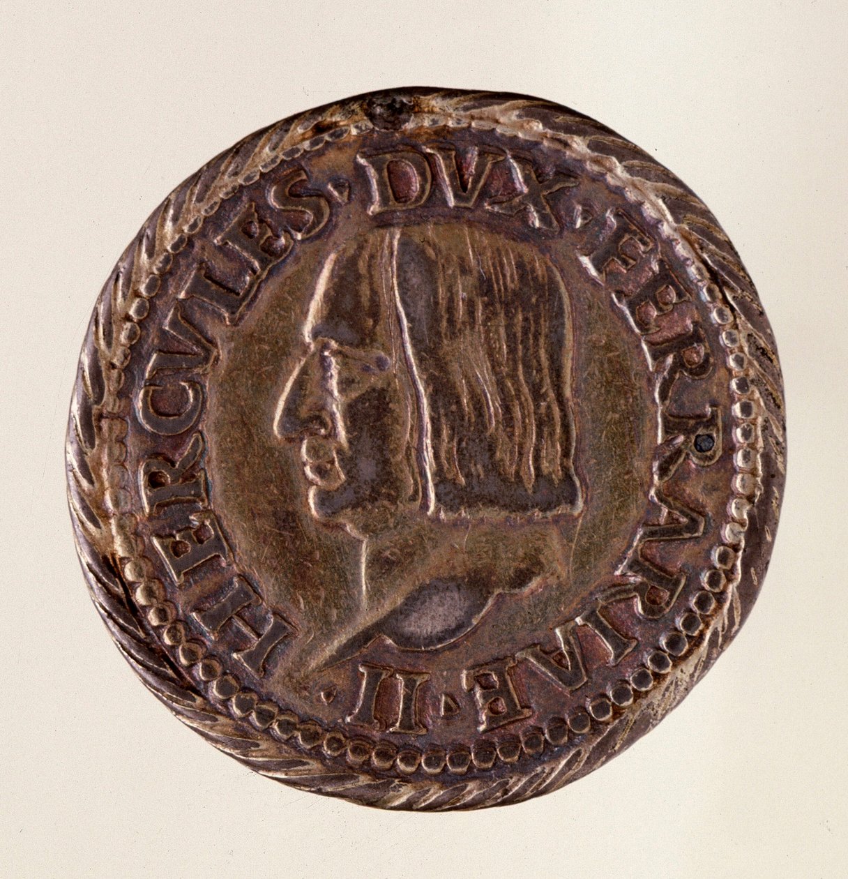 Moeda de prata (testone) de Ferrara (Ferrara): reinado do duque Ercole I d