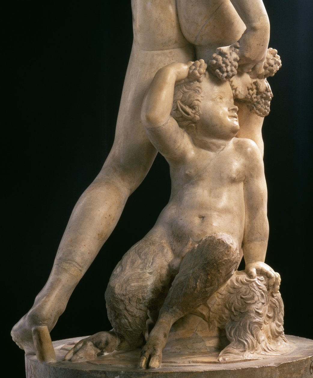 Bacchus, detalhe da metade inferior, escultura de Jacopo Sansovino (1486-1570) (mármore) (ver também 79847) de Jacopo Sansovino