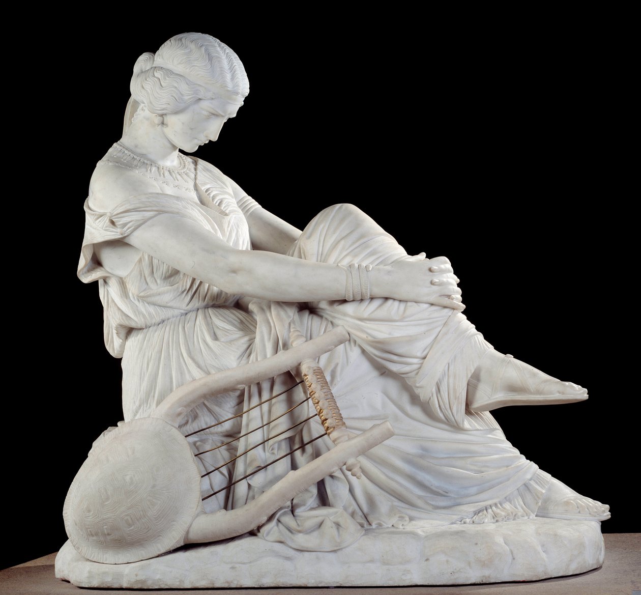 Sapho (ou Sappho, século VII a.C.), poeta grego da Antiguidade. Escultura em mármore de James Pradier (1790-1852) de James Pradier