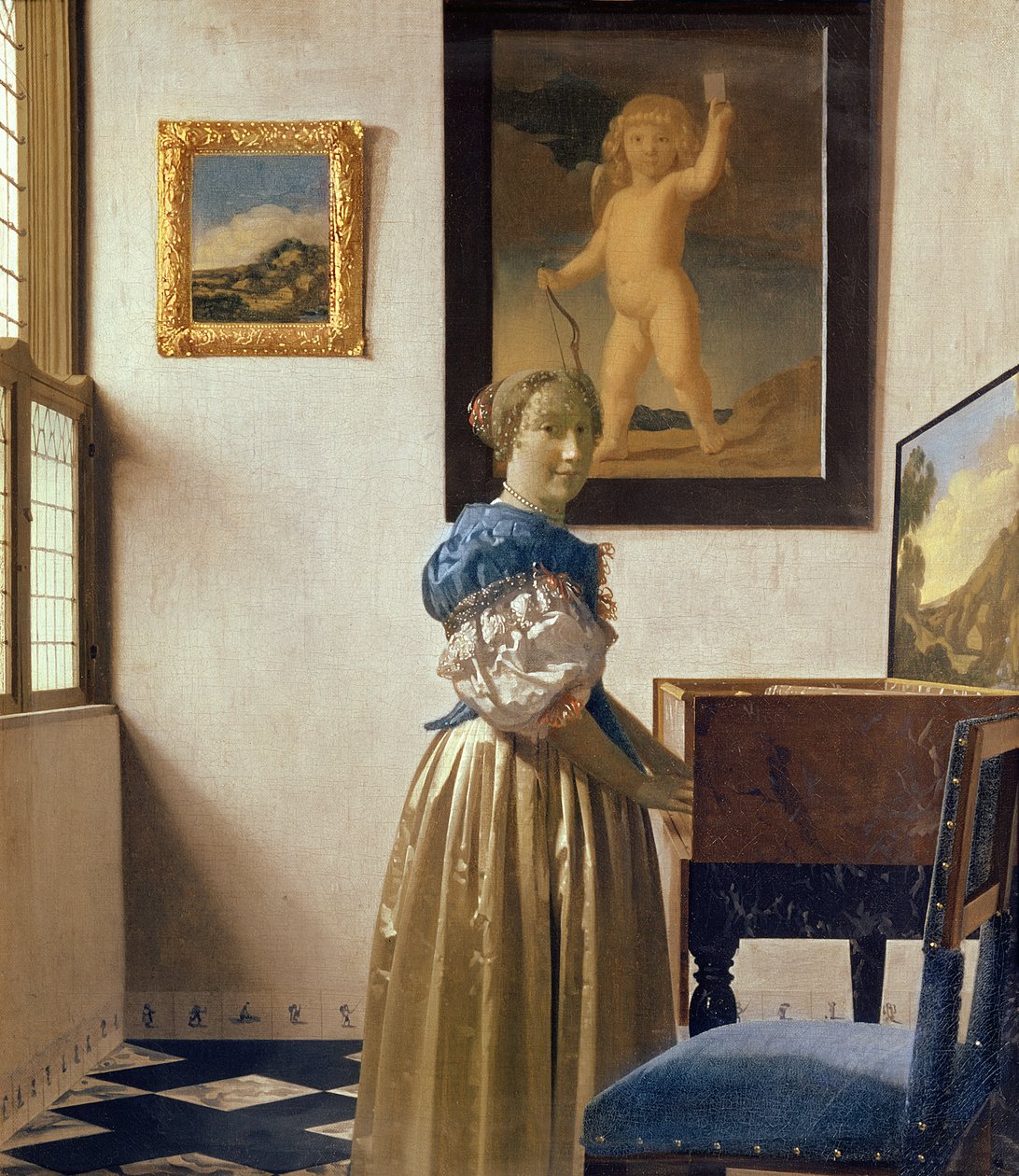 Uma jovem mulher de pé em um Virginal, c.1670-72 de Jan Vermeer van Delft