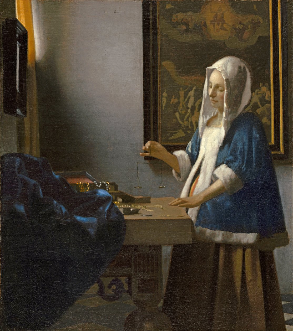 Mulher segura, um, equilíbrio de Jan Vermeer van Delft