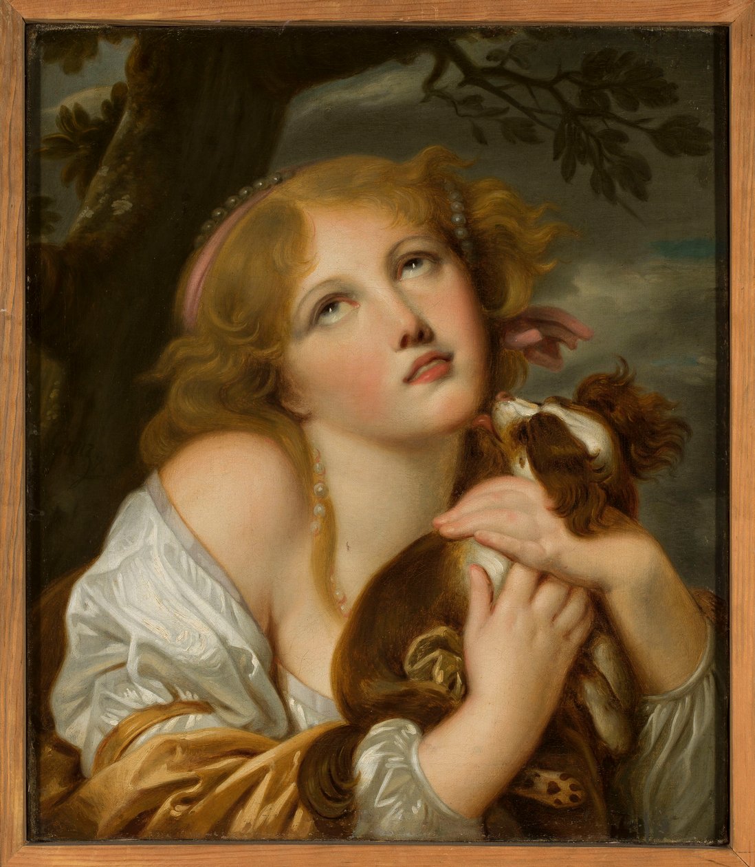 Rapariga com um cão nos braços de Jean-Baptiste Greuze