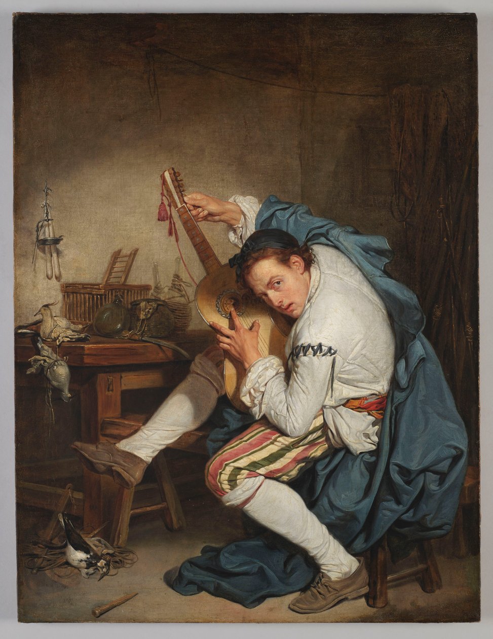 O guitarrista de Jean-Baptiste Greuze