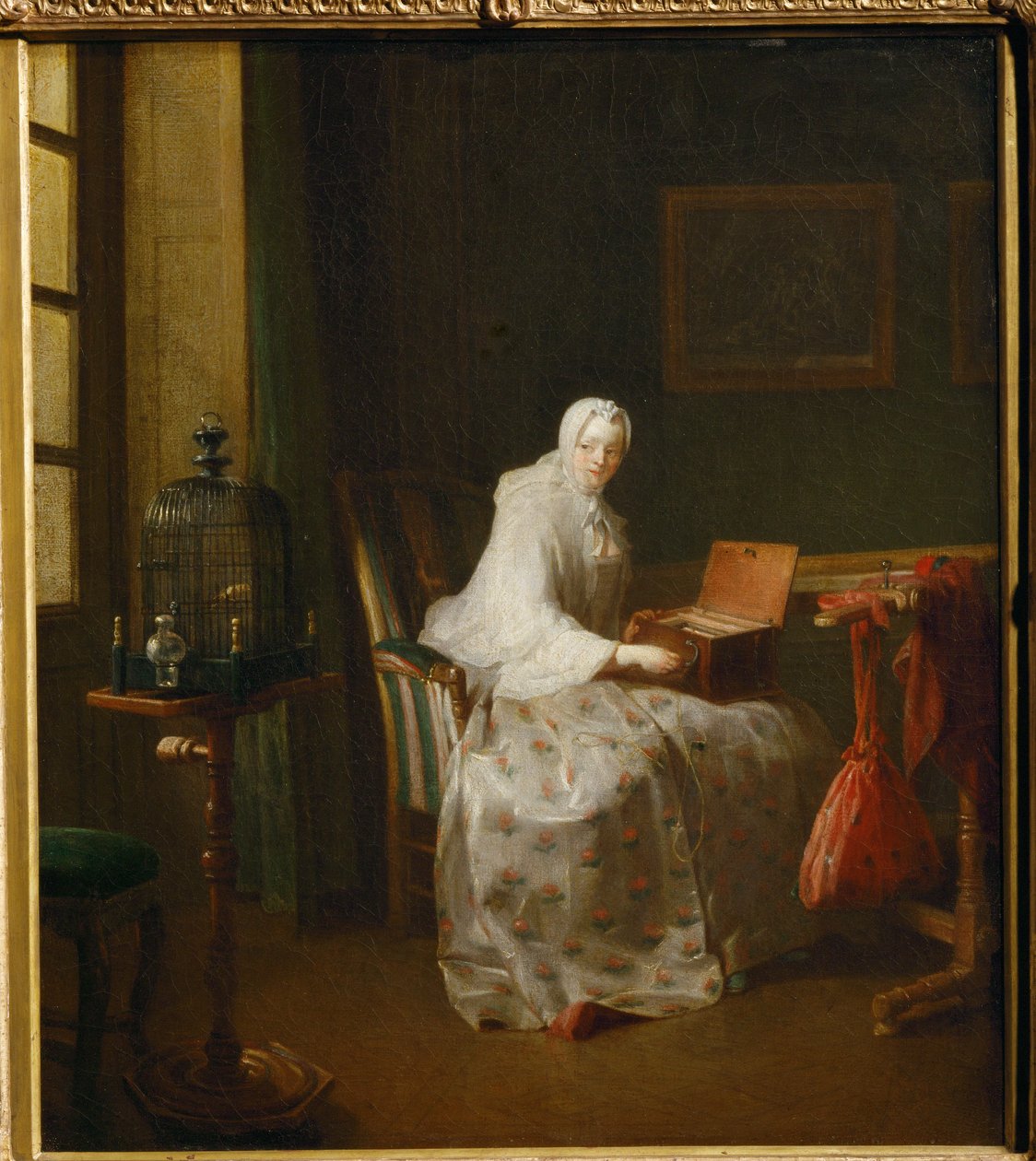 La serinette, dit aussi Dame variant ses amusements - uma serinette é um pequeno órgão mecânico utilizado para ensinar os pássaros a cantar ... de Jean Baptiste Simeon Chardin