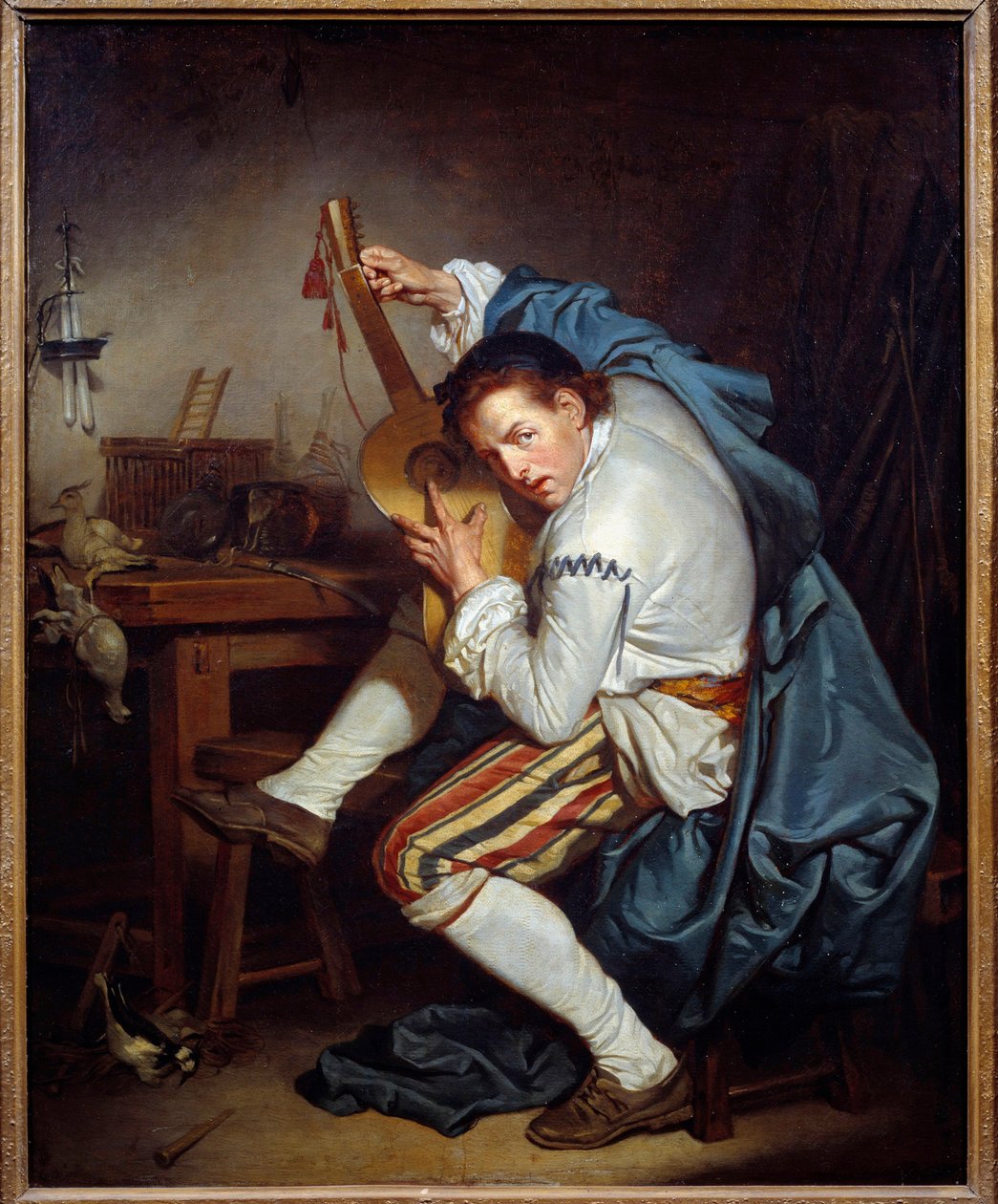O guitarrista, ou um pássaro que, no regresso da caça, concede a sua guitarra Pintura de Jean Baptiste Greuze (1725-1805) Sol do século XVIII. 0,71x0,57 m Nantes, Musee des Beaux Arts de Jean Baptiste Greuze