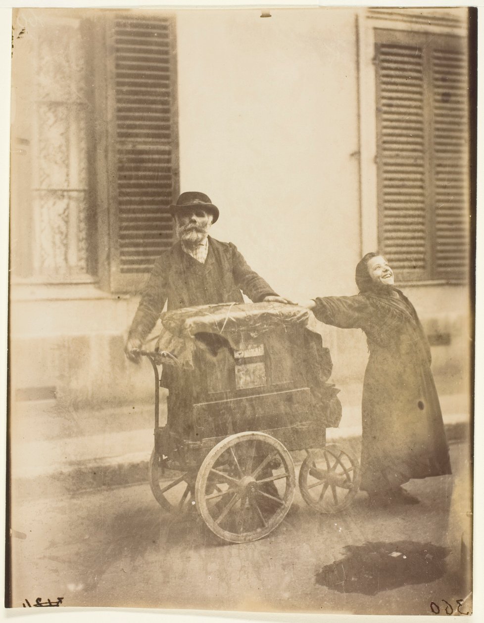 Tocador de órgão de Jean Eugène Auguste Atget