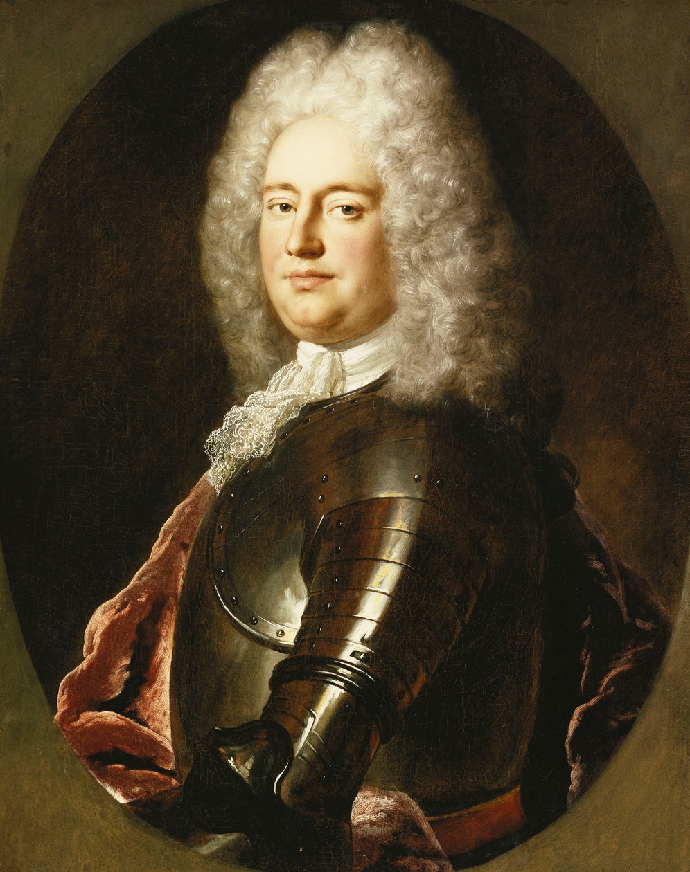 Retrato de um cavalheiro, meio comprimento, em armadura, um jabot branco e um carmesim, em um oval pintado, de Jean Marc Nattier