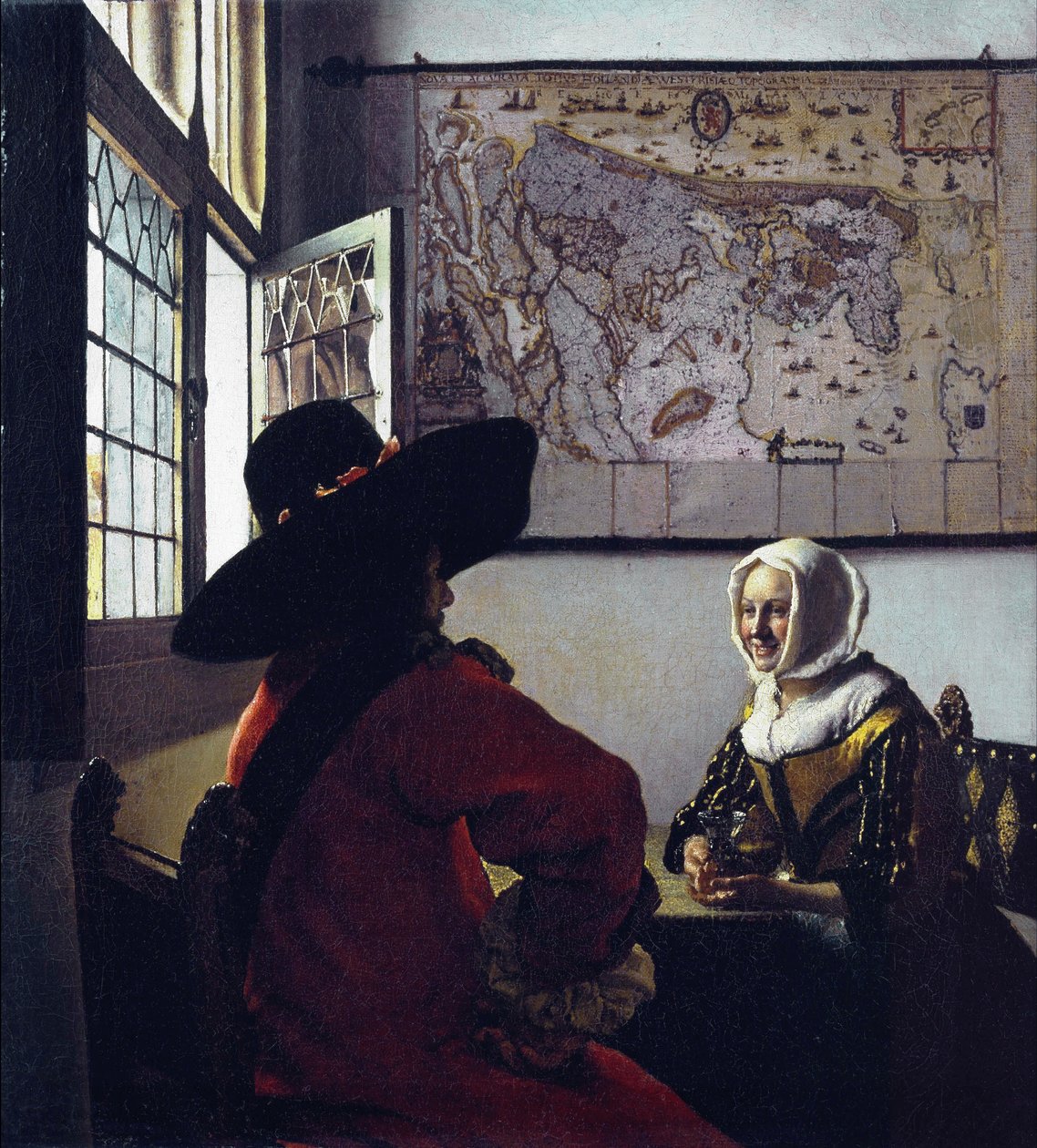Oficial e uma garota rindo de Jan Vermeer van Delft