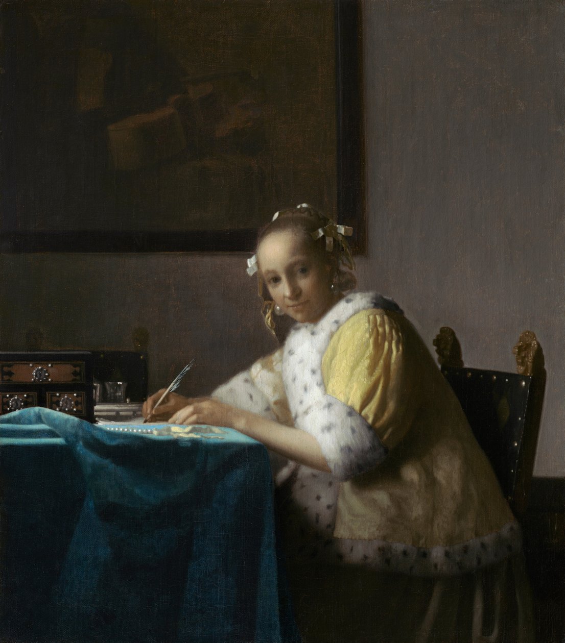 Eine Dame schreibt de Johannes Vermeer