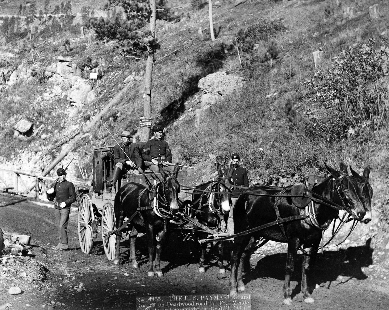 O US Paymaster e guardas na estrada de Deadwood para Ft. Meade, 1888 de John C. H. Grabill