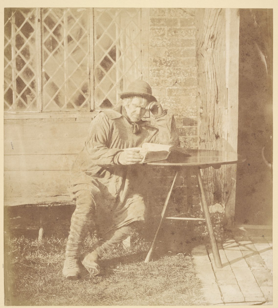 [Homem a ler um livro]. de John Whistler