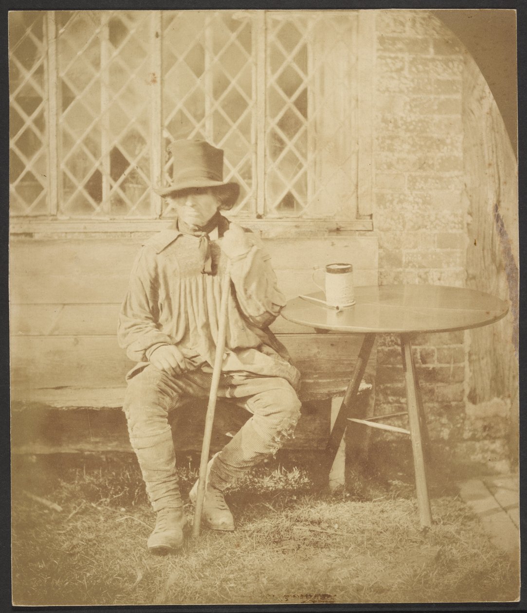 [Homem sentado à mesa]. de John Whistler