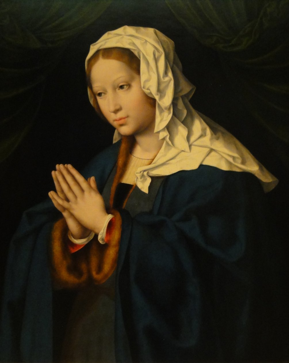 Betende maria de Joos van Cleve