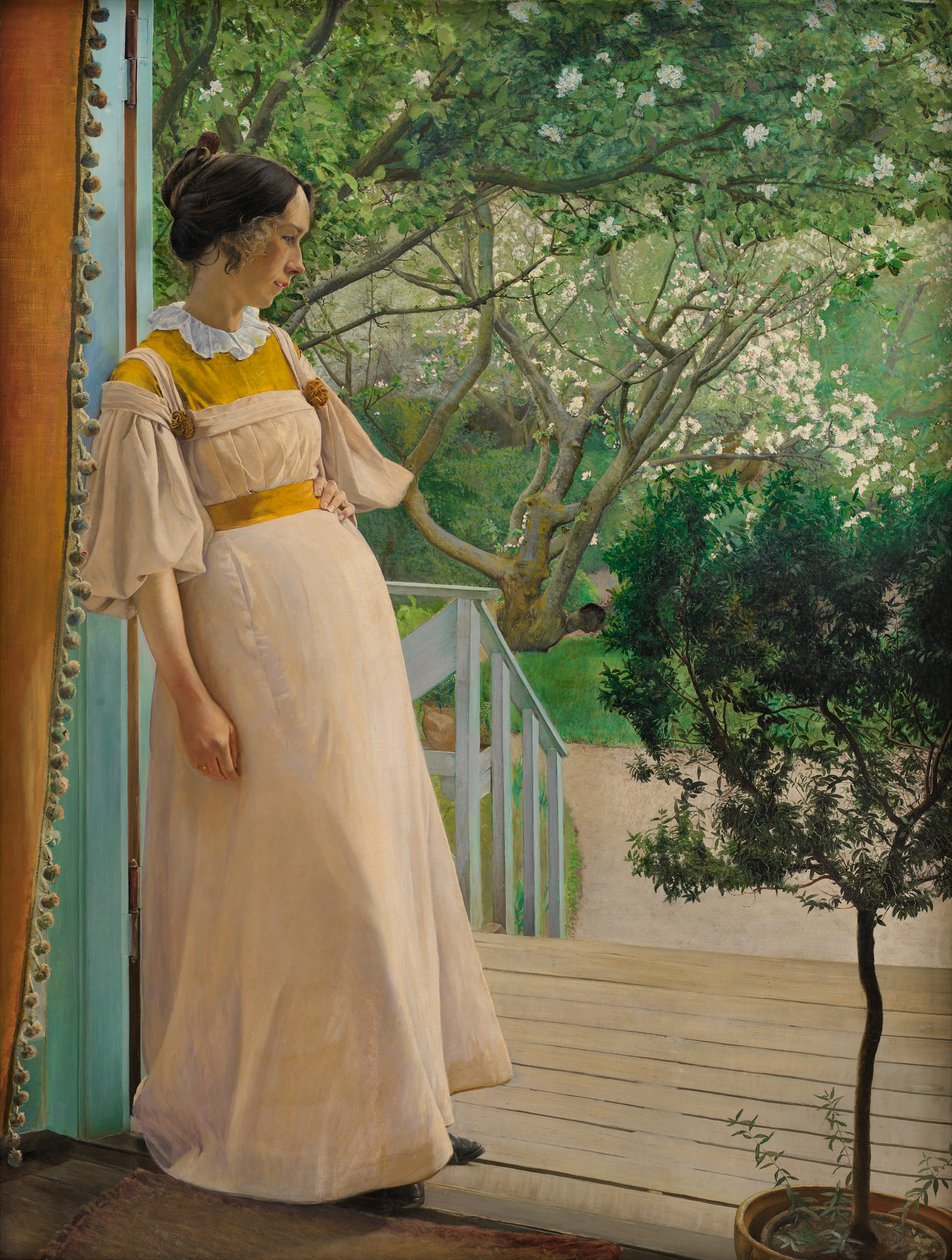 Na porta do jardim. A esposa do artista, 1897. de Laurits Andersen Ring