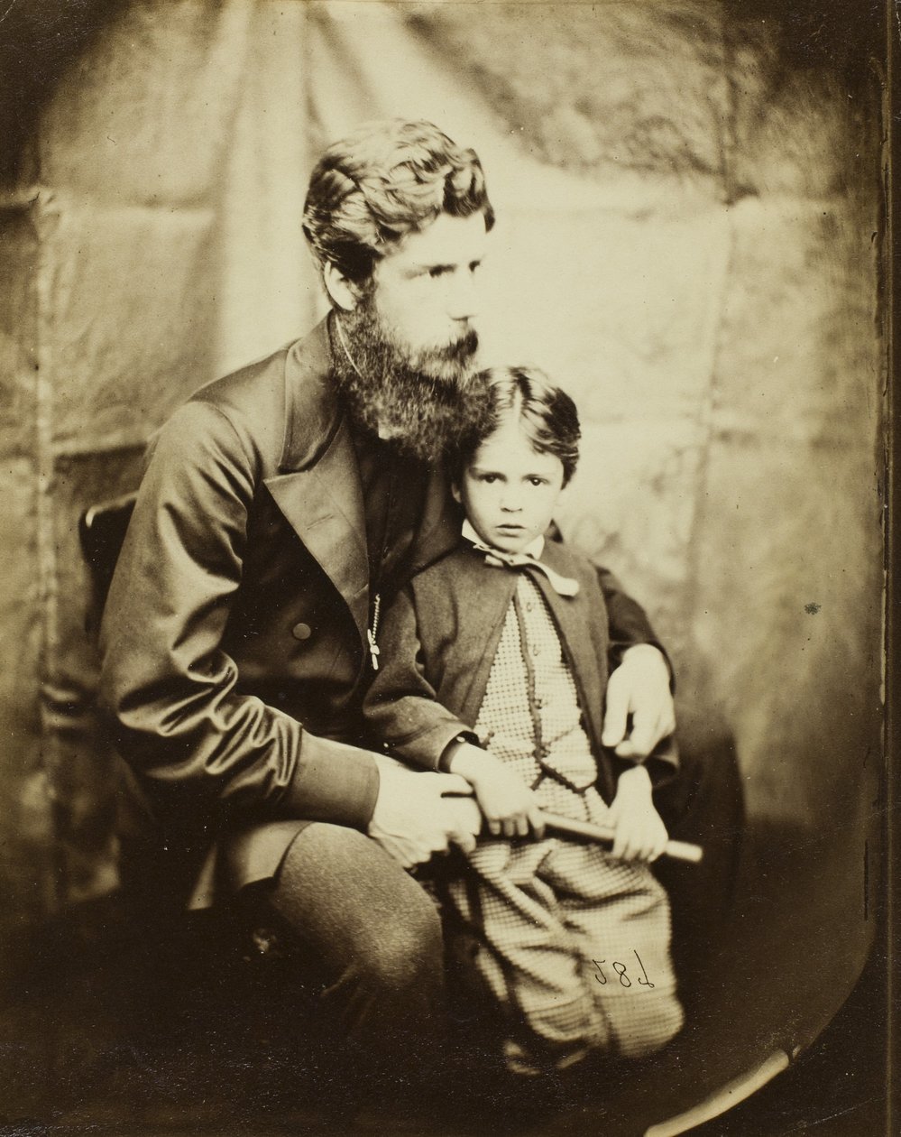 Rev. James Langton Clark e filho Charles de Lewis Carroll