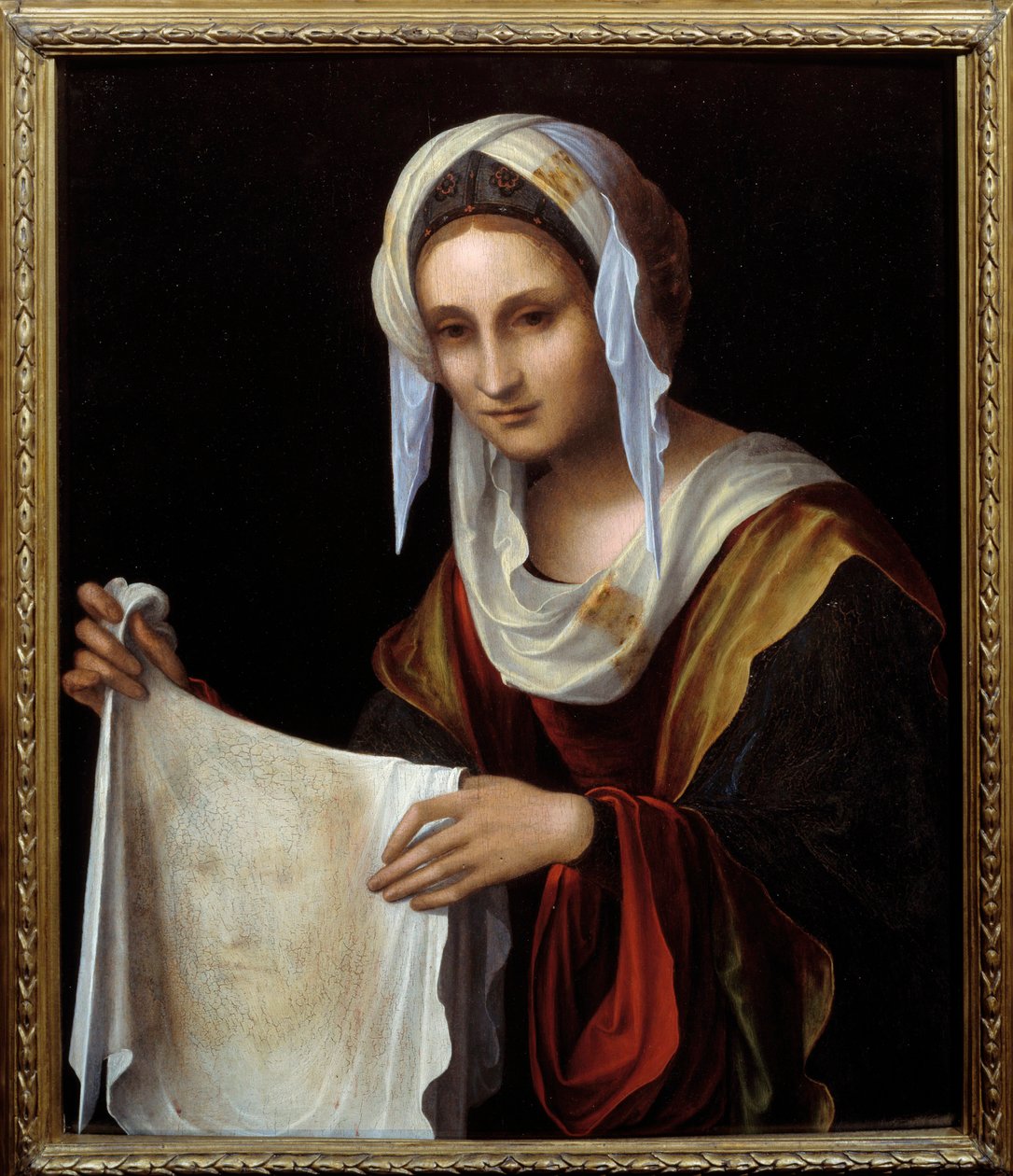 Santa Verónica. O Santo Véu representa o rosto de Cristo, cujo suor Verónica foi dito ter suado durante a subida ao Calvário. Pintura de Lorenzo Costa (1460-1535) Sol. 0,64x0,54 m de Lorenzo Costa