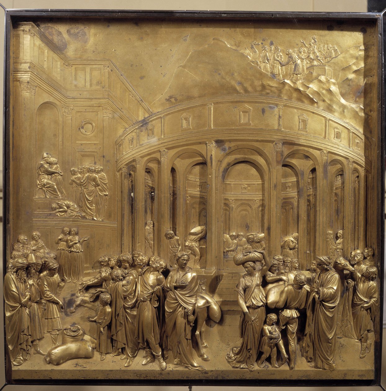 História da vida de José. Colheita do trigo: os agricultores trazem os sacos de cereais. Painel original da porta do Paraíso de Lorenzo Ghiberti
