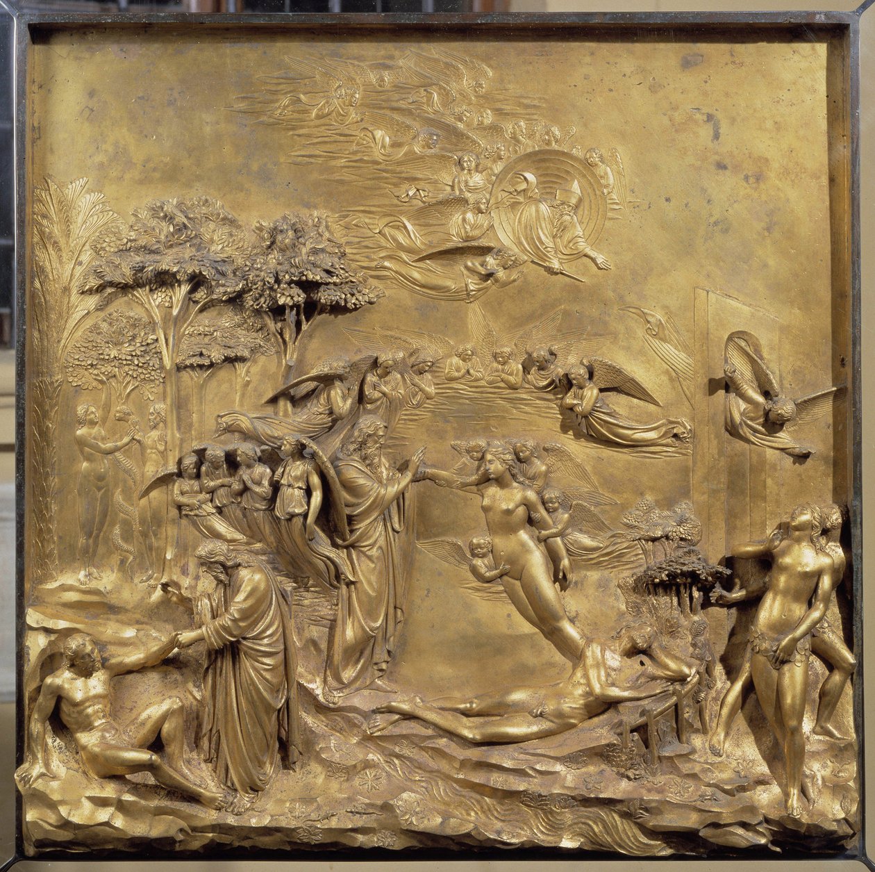 História da vida de Adão: o nascimento de Adão, a criação de Eva e Adão e Eva caçam do Paraíso. Painel original da porta do Paraíso de Lorenzo Ghiberti