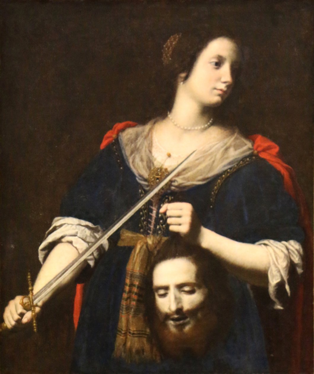 Judite segurando a cabeça de Holofernes. de Lorenzo Lippi