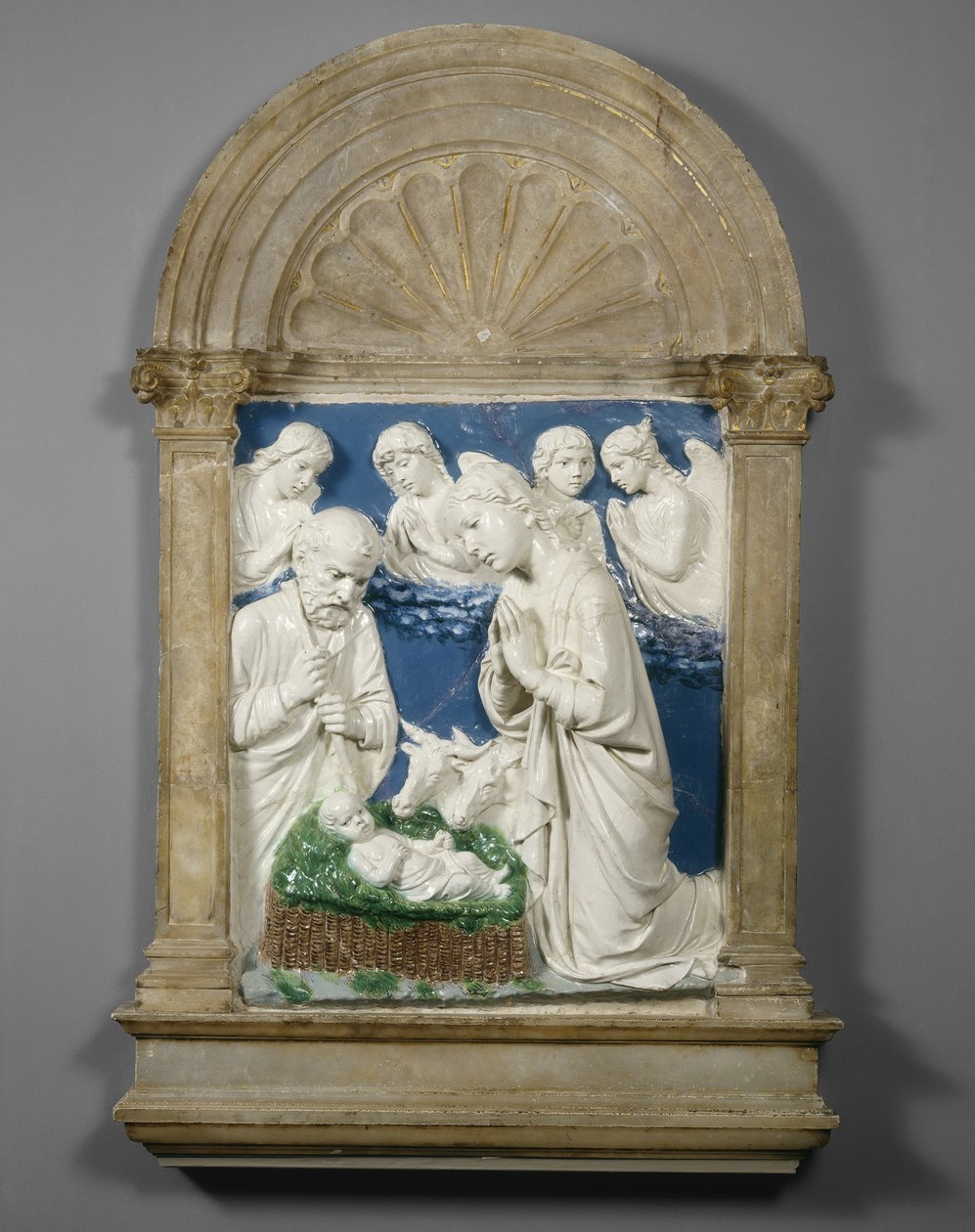 A Natividade, c.1460 (terracota vidrada) de Luca Della Robbia