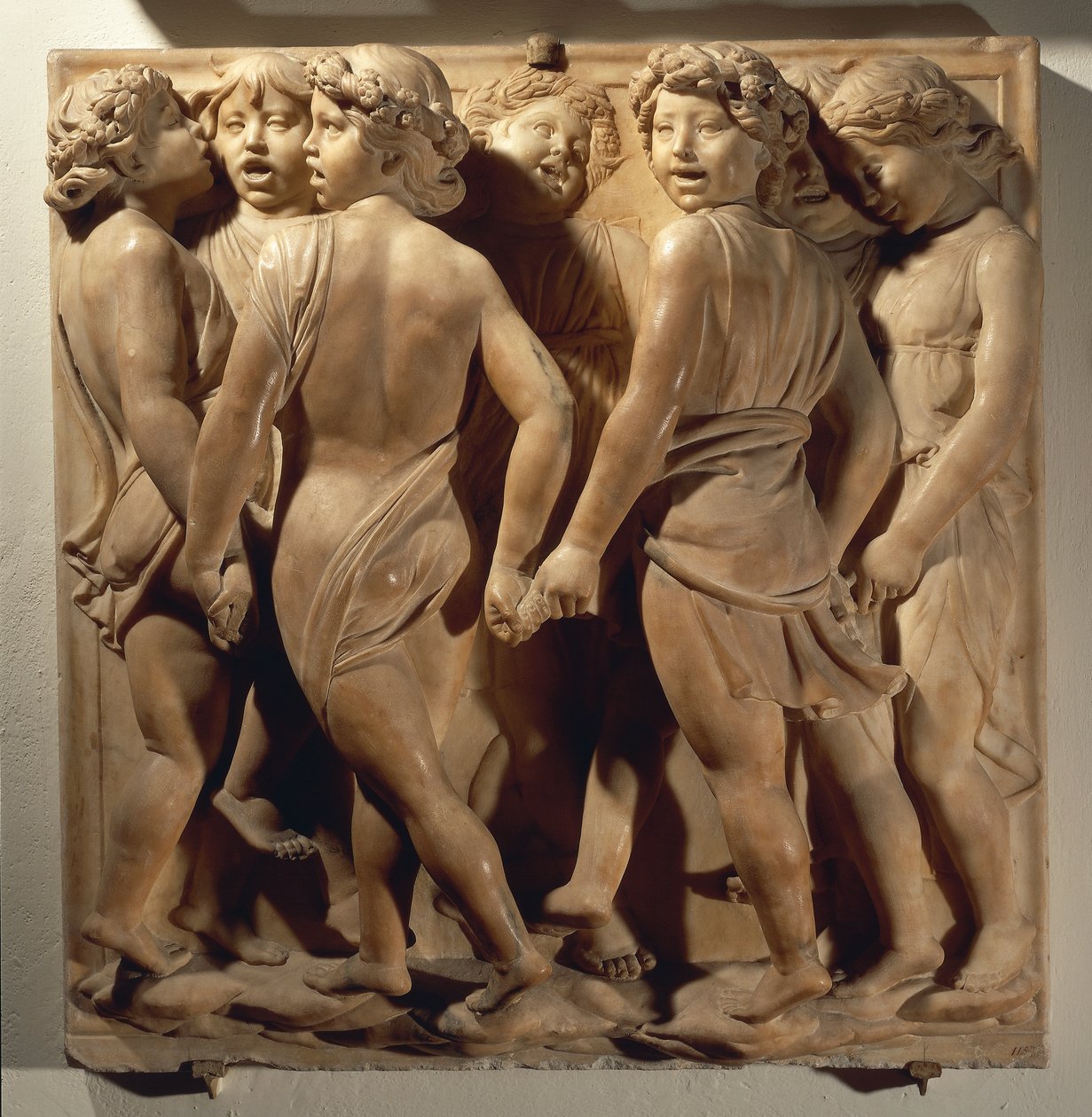 Laudate Eum em choro (Salmo 150, Laudate Dominum), painel com meninos cantando e dançando em círculo de Luca Della Robbia