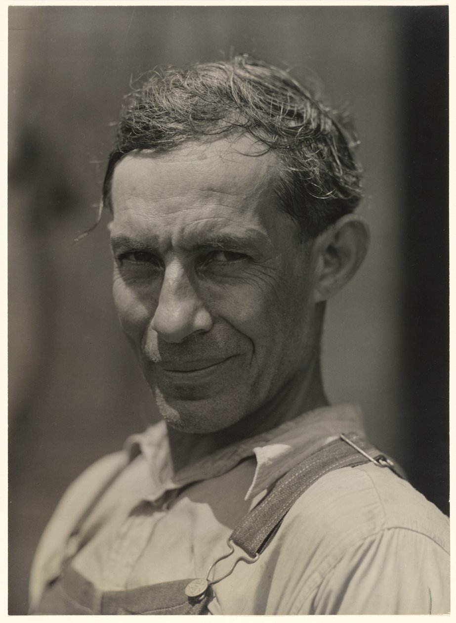 Mulato Trabalhador na plantação de algodão de John Henry. Tinha talento para o artesanato e para a tecelagem.  Melrose, Louisiana de Marion Post Wolcott