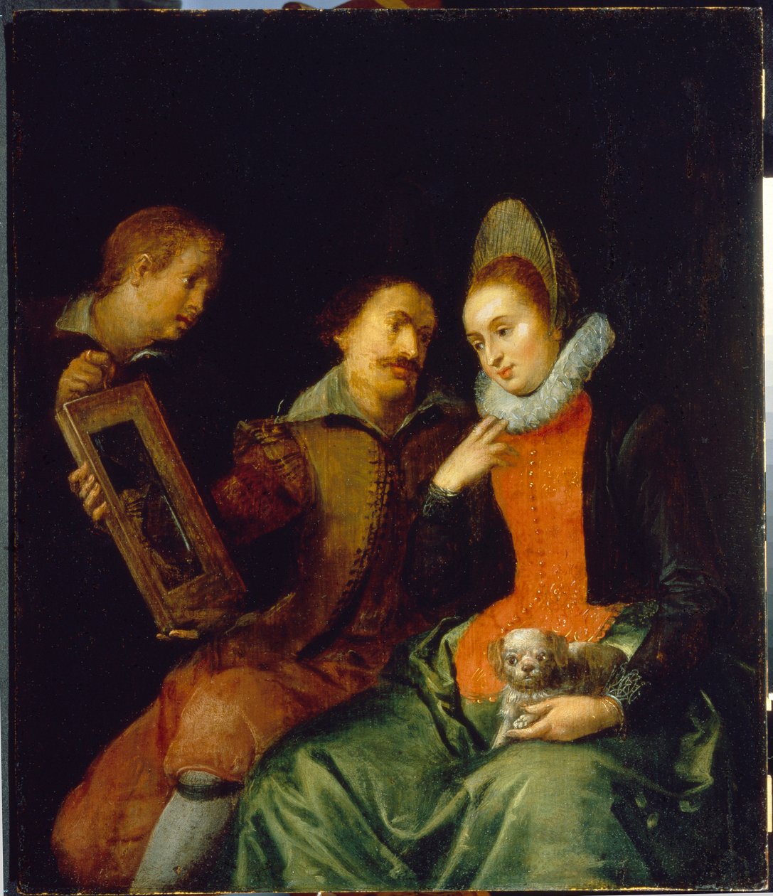 Alegoria da visão. Uma jovem carregando um cachorrinho se olha em um espelho segurado por um homem e um adolescente que a olham atentamente. Pintura de Marten Pepyn (Pepin) (1575-1643), óleo sobre tela, início do século XVII, arte flamenga. Collecti de Martin Pepyn or Pepin