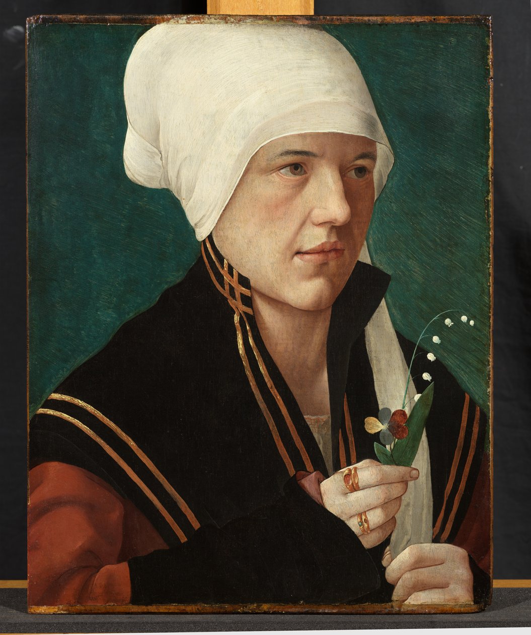 Retrato de uma mulher segurando um lírio-do-vale e um amor-perfeito, 1510-20 de Marx Reichlich