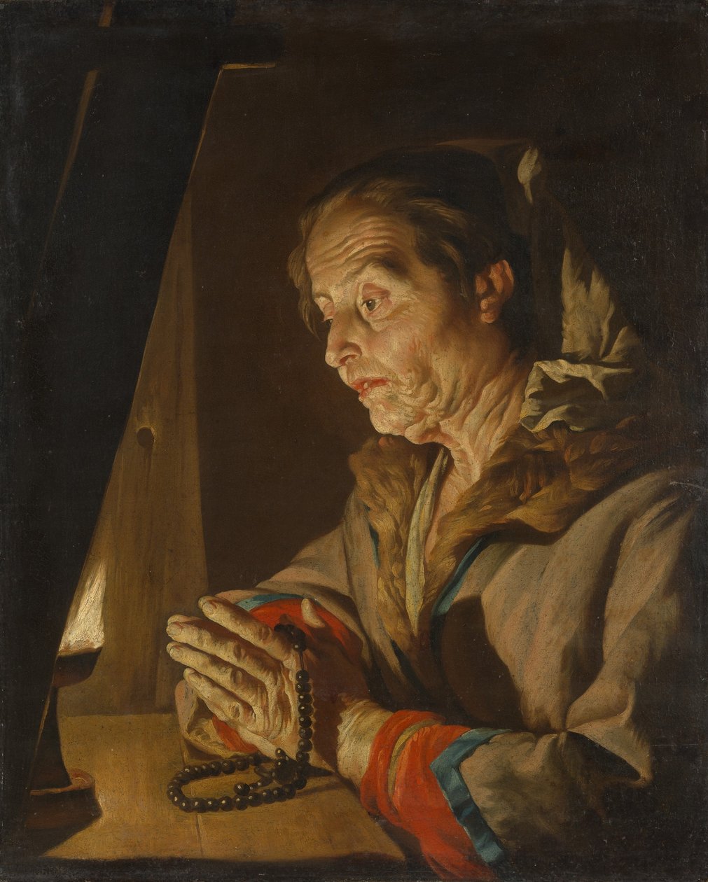 Mulher idosa orando, final dos anos 1630 ou início dos 1640. de Matthias Stomer