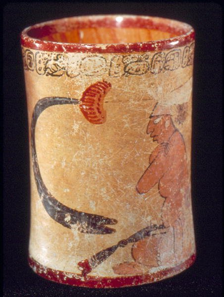 Recipiente cilíndrico com glifos descrevendo um rei (barro) de Mayan