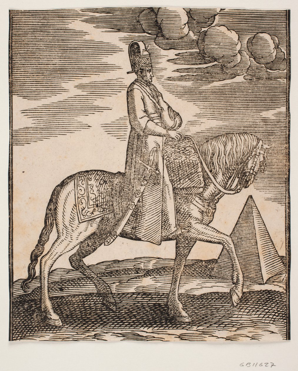 Cavaleiro com cantil no pescoço, perfil para a direita; uma espada à sua direita e bagagem à sua frente, pendurada na sela; à direita, ao fundo, uma pirâmide de Melchior Lorck