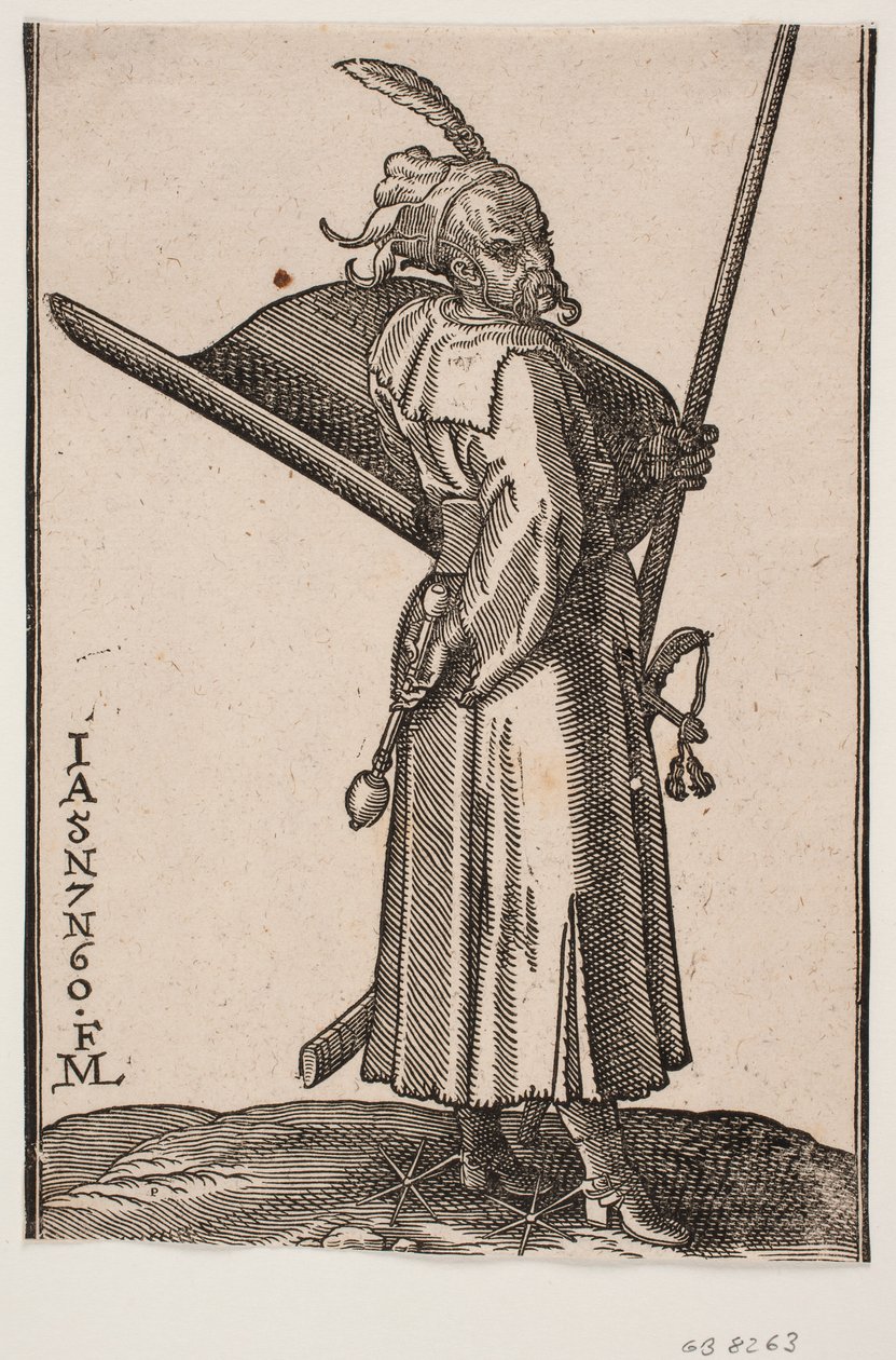 Soldado em pé (akinci), perfil para r.; em r. entregar um porrete, no v. entregar uma lança, cujo topo está fora da linha de armação superior; na r. armar um escudo com a parte interna virada para cima, na r. uma espada de Melchior Lorck