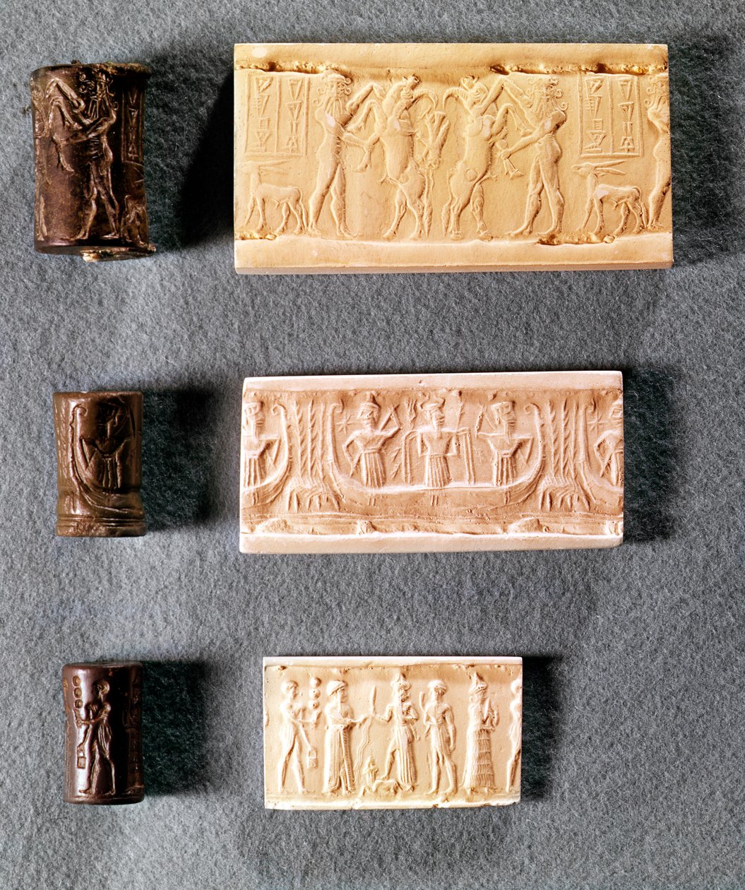 Três selos cilíndricos com impressões, 1º milénio aC (metal e gesso) de Mesopotamian