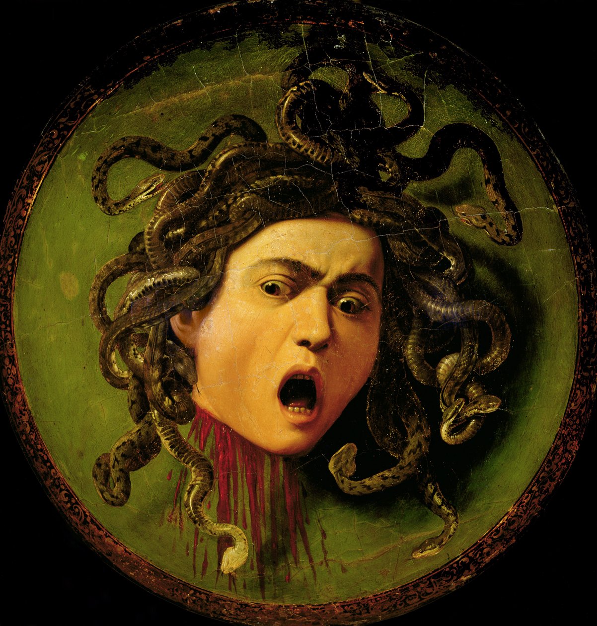 Medusa, pintada num escudo de couro, c.1596-98 (óleo sobre tela fixado em madeira) (pré-restauro) de Michelangelo Merisi da Caravaggio