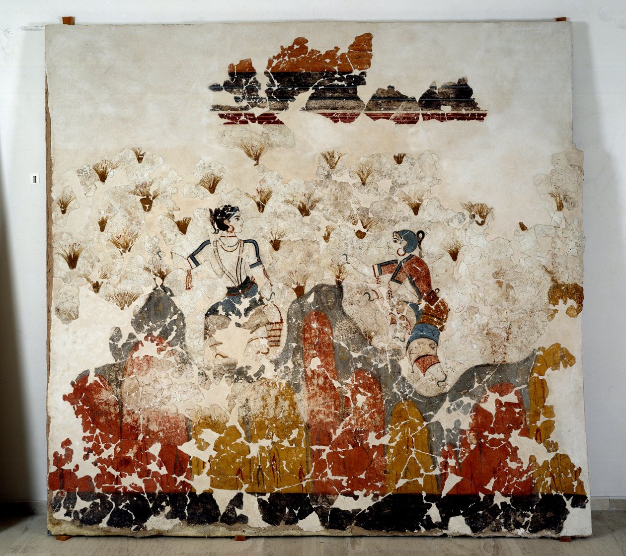 Civilização minóica: mulheres a colher açafrão. Fresco da bacia lustral do Xeste 3 em Akrotiri (Thera), Santorini. Dim. 244x266 cm Século XVI a.C. Santorini, Colecção dos frescos de Akrotiri a Thera. de Minoan