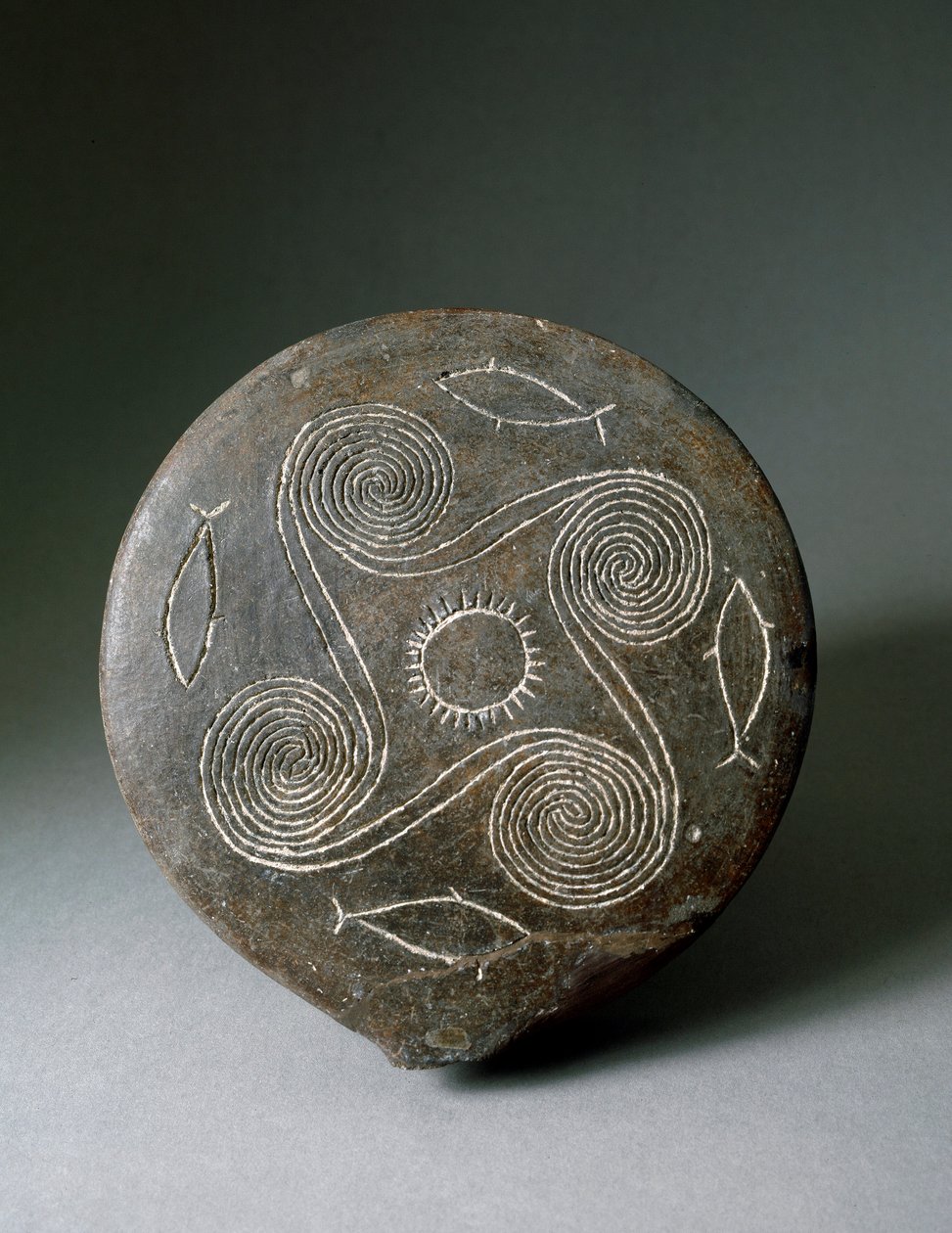 Arte minóica: disco circular de Naxos em terracota. A civilização minóica. 2400-2000 AC. Athenes, Museu Nacional de Arqueologia. de Minoan
