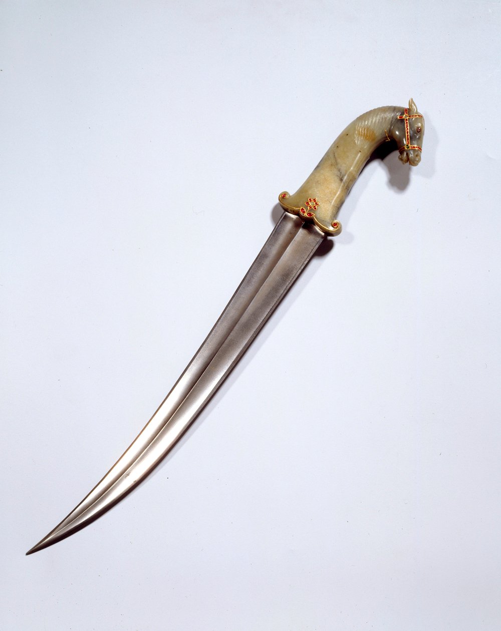 Arte mughal: adaga de cabeça de cavalo em aço damasco. Século XVII. Sol 0,5 m Paris, Musee du Louvre de Mughal School