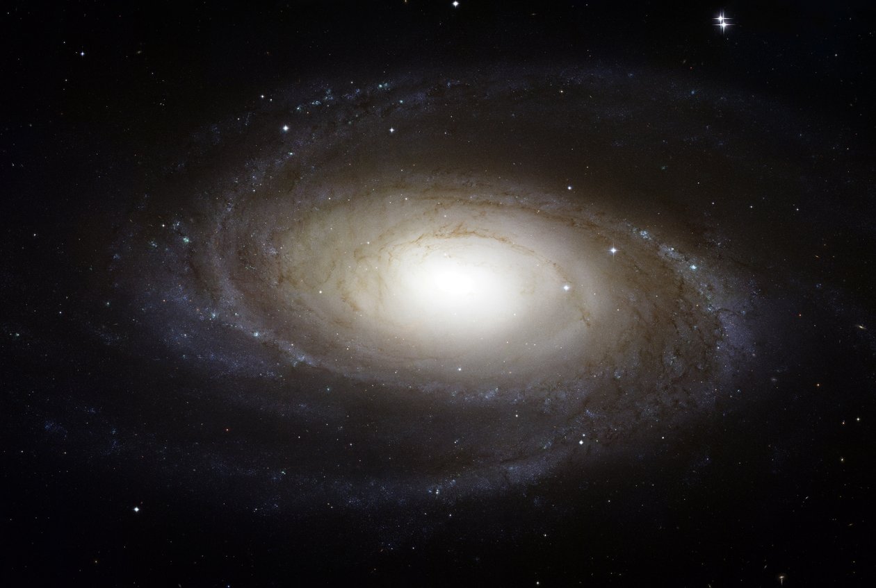 Galáxia espiral brilhante M81 visto do telescópio de Hubble. Crédito NASA Espaço estelar da astronomia da ciência de National Aeronautics and Space Administration National Aeronautics and Space Administration