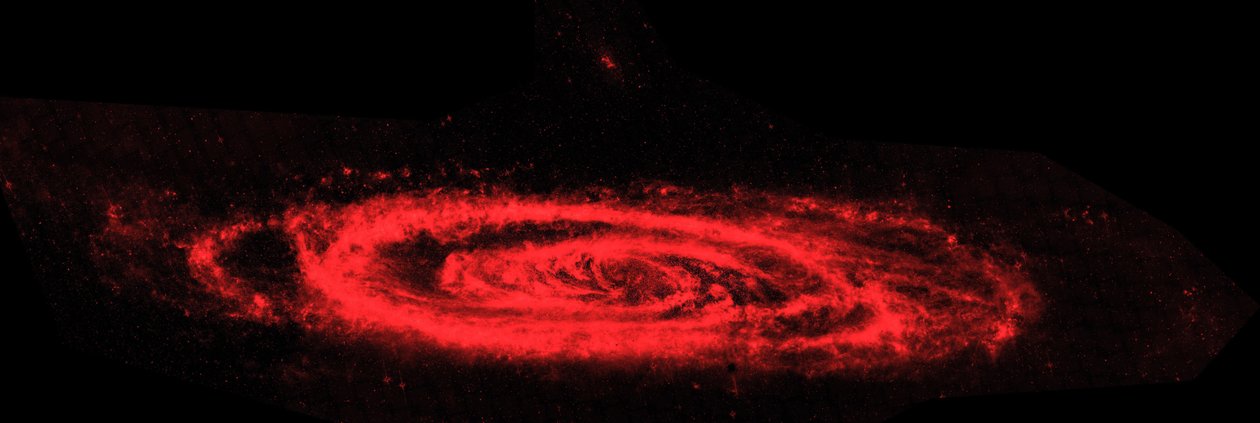 Telescópio Espacial Spitzer imagens compostas infravermelhas como a galáxia de Andrômeda. A imagem principal destaca o contraste entre as galaxys ondas agitadas de poeira (vermelho) e o mar suave de estrelas mais antigas. Crédito NASA de National Aeronautics and Space Administration National Aeronautics and Space Administration