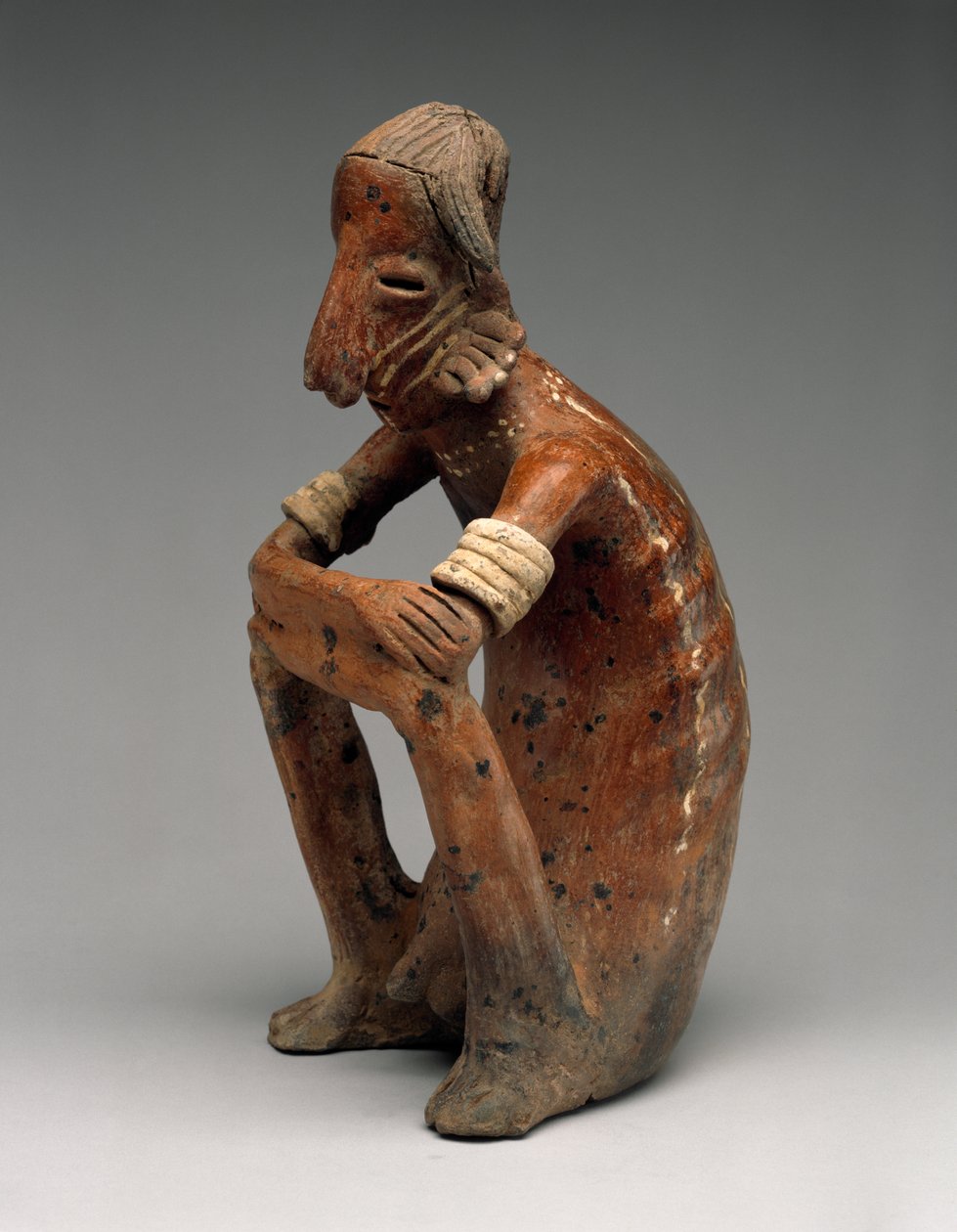 Homem Sentado Emagrecido, Proto-Clássico, 100 aC-AD 300 (louça de barro com pintura deslizante policromada) de Nayarit