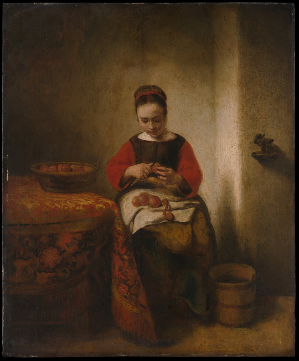 Jovem mulher a descascar maçãs de Nicolaes Maes