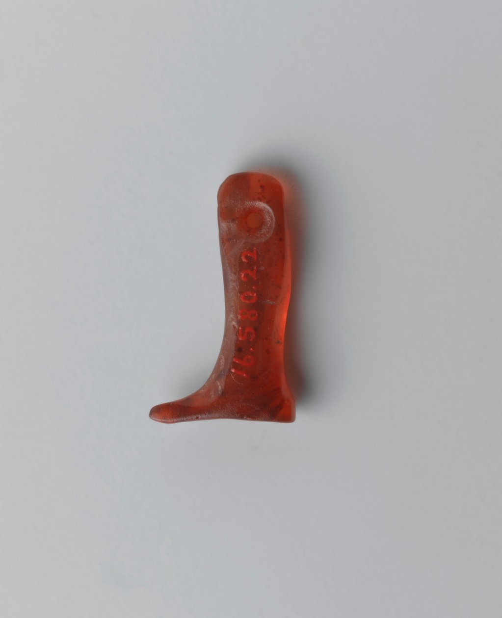 Amuleto de uma perna direita humana (cornalina) de Old Kingdom Egyptian