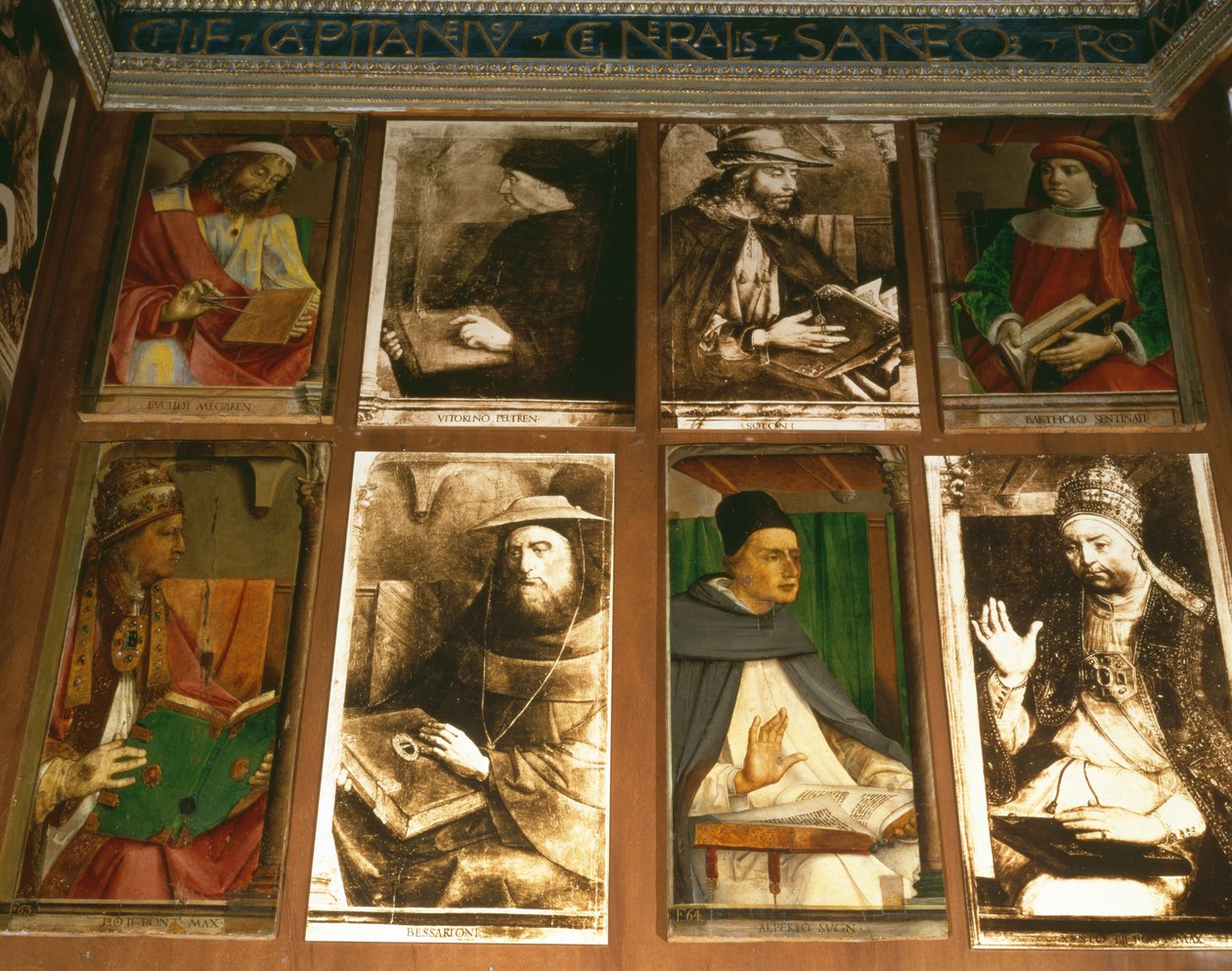 O Estudo de Federigo da Montefeltro, Duque de Urbino, no sentido horário de TL: Euclides de Megara, filósofo grego (450-374 aC); Vittorino da Feltre, educador italiano (1378-1446); Solon, legislador ateniense de P. Joos van Gent and Berruguete
